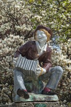 Statue of a boy with an accordion
