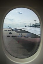 View out the window of the wing of an Airbus A380-800