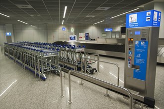 Baggage trolleys and machine