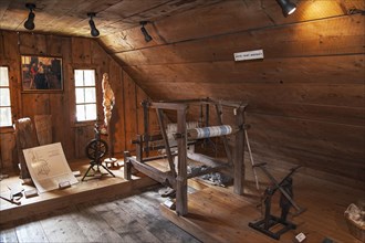 Old spinning wheel and loom