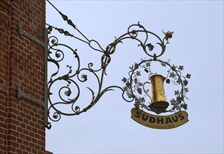 Sudhaus. hanging sign