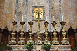 Candlesticks and crucifix on the altar