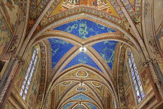 Ceiling vaults decorated with frescoes in the upper church of San Francesco Basilica