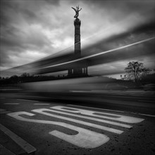 View of the Berlin Victory Column with bus lane markings in the foreground