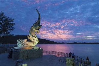 Dragon fountain at dusk on the promenade in Songkhla