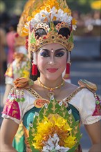 Balinese woman performing at the opening parade of the 2015 Bali Arts Festival