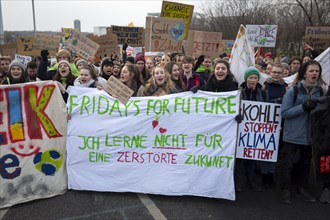 Demonstrators with banner Fridays for Future