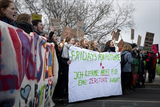 Demonstrators with banner Fridays for Future