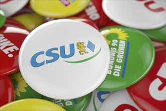 German political party CSU button in front between other governing party buttons