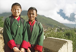 Girls wearing the traditional Kira dress in Paro