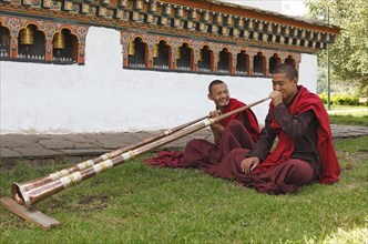 Monks playing tibetan horns
