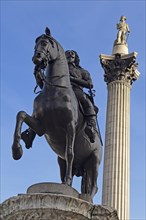 Equestrian statue of King Charles I with Nelson's Column at the back