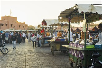 People and stalls selling food