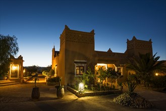 Kasbah style hotel at twilight