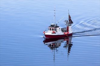 Fishing boat with reflection on Sildpollen