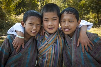 Three boys with traditional clothing