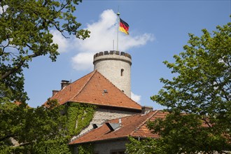 Sparrenburg or Sparrenberg Castle with waving flag