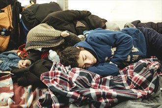 Refugees sleeping in the tent