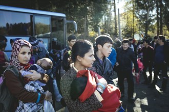 Arrival of a bus with refugees