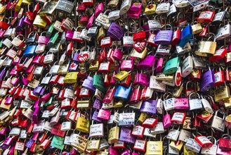 Many colourful love padlocks at the wall of Juliet's house