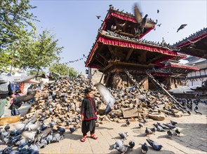 Bricks are still piled up near the old temples after the 2015 earthquake