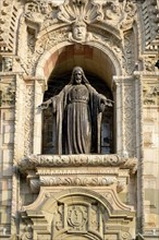 Christ statue on the facade of the cathedral in the Plaza Mayor or Plaza de Armas
