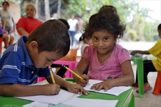Children drawing at a children's festival