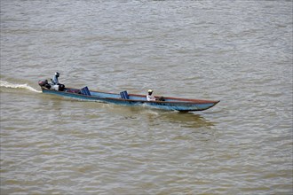 Traditional wooden boat with outboard motor on Atrato River