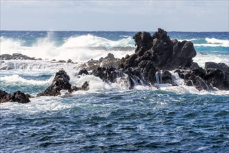Waves breaking on the rocks
