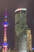 Pudong financial district with Oriental Pearl Tower at night