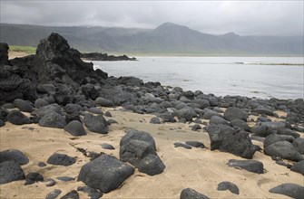 Beach with large volcanic rocks