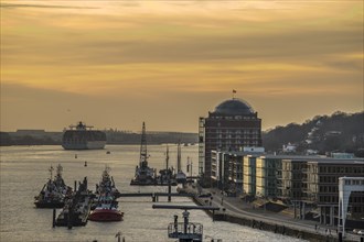 Harbour with pilot boats at sunset