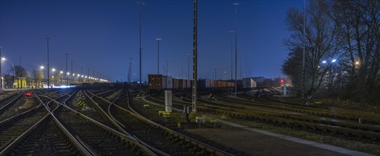 Storage tracks with freight trains in the evening