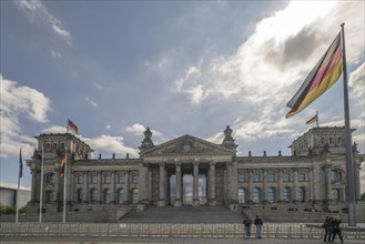 German Bundestag with waving German flags