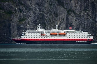 Ship Kong Harald of the shipping company Hurtigruten ASA in Storfjord