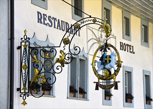 Restaurant sign with the horse-rider St. Georg