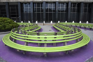 Curved bench in front of the US Citizenship and Immigration Services building