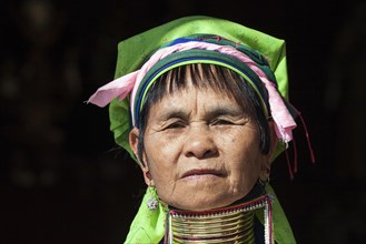 Woman from the tribe of the Padaung in typical dress and headgear