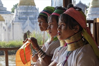 Women from the Padaung tribe in typical dress and headgear