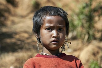 Local girl from the Ann tribe in a mountain village at Pin Tauk