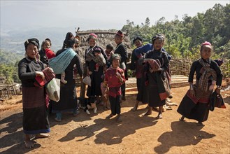 Local women and children in typical clothing from the Ann tribe in a mountain village at Pin Tauk