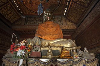 Buddha statues inside the Buddhist monastery Wan Sen