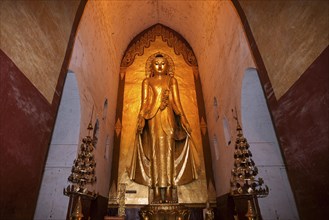 Standing gilded Buddha