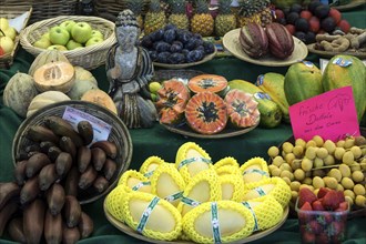 Various exotic fruits at a fruit stand