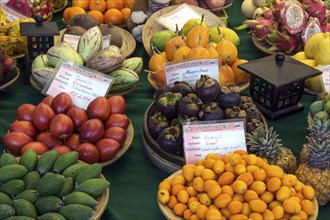 Various exotic fruits at a fruit stand