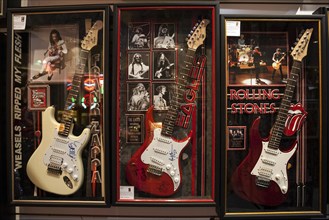 Guitars with autographs of various famous musicians
