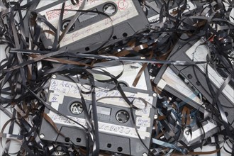 Old cassettes with tangled cables