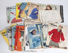 Front pages of old fashion magazines from the 1950s