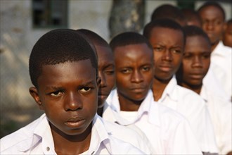 Group of students in schoolyard during morning assembly