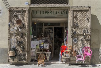 Old Italian junk shop in San Quirico d'Orcia
